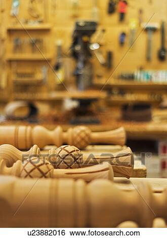 Stock Photograph - Wooden parts of furniture in carpentry workshop. Fotosearch