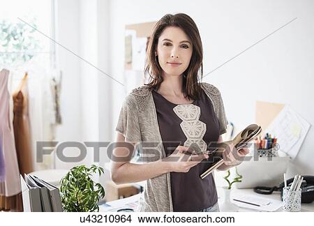 Young woman looking at camera View Large Photo Image Picture - Young woman looking at camera. Fotosearch