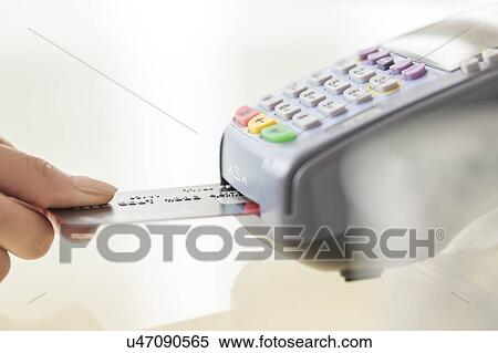 Young woman paying with credit card View Large Photo Image Stock Photography - Young woman paying with credit card. Fotosearch