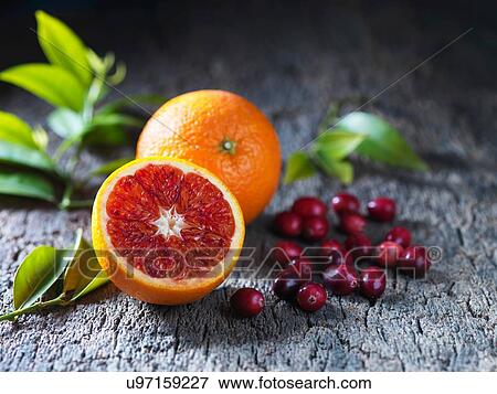 Cranberries and oranges View Large Photo Image Stock Photo - Cranberries and oranges. Fotosearch
