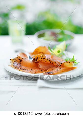 Deli salmon, with sliced lemon and green salad leaves View Large Photo Image Stock Image - Deli salmon, with sliced lemon and green salad leaves. Fotosearch