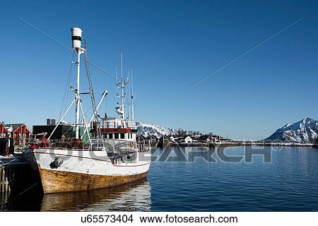 Picture - Fishing boat in harbour, Svolvaer, Lofoten Islands, Norway. Fotosearch