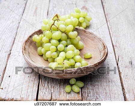 Stock Photo - Grapes in wooden bowl. Fotosearch