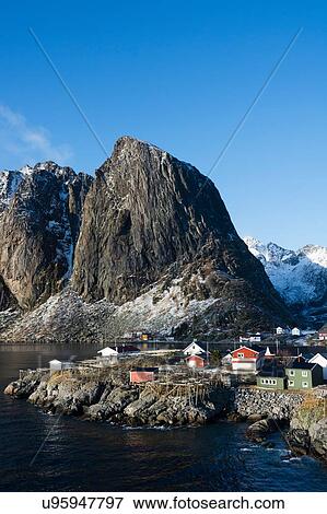 Landscape with waterfront houses and mountains, Hamnoy, Lofoten Islands, Norway View Large Photo Image Stock Photo - Landscape with waterfront houses and mountains, Hamnoy, Lofoten Islands, Norway. Fotosearch