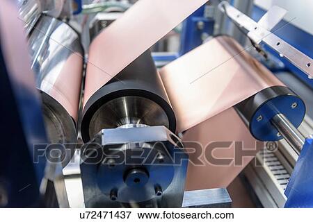 Manufacturing lithium ion batteries in battery research facility View Large Photo Image Stock Photo - Manufacturing lithium ion batteries in battery research facility. Fotosearch