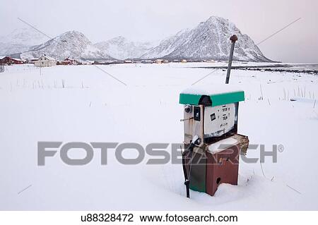 Old gas pump in snow covered landscape, Noss, Lofoten Islands, Norway View Large Photo Image Stock Image - Old gas pump in snow covered landscape, Noss, Lofoten Islands, Norway. Fotosearch