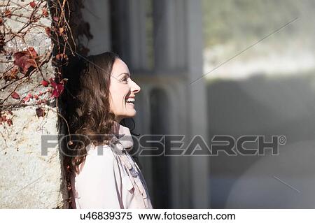 Profile portrait of woman leaning against wall at Thornbury Castle, South Gloucestershire, UK View Large Photo Image Stock Photography - Profile portrait of woman leaning against wall at Thornbury Castle, South Gloucestershire, UK. Fotosearch