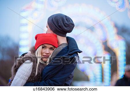 Romantic young couple at xmas festival in Hyde Park, London, UK View Large Photo Image Stock Photograph - Romantic young couple at xmas festival in Hyde Park, London, UK. Fotosearch