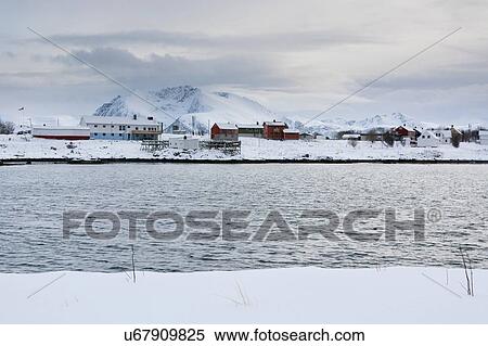 Snow covered landscape and distant houses, Andenes, Lofoten Islands, Norway View Large Photo Image Stock Photography - Snow covered landscape and distant houses, Andenes, Lofoten Islands, Norway. Fotosearch