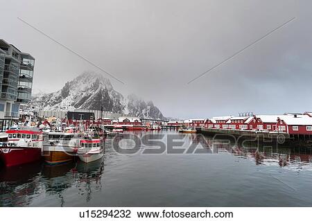 Stock Image - Storm clouds over waterfront, Svolvaer, Lofoten Islands, Norway. Fotosearch