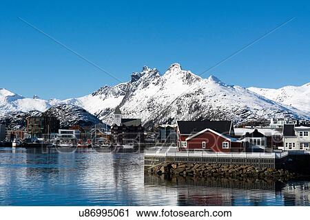 View of waterfront houses and snow capped mountains, Svolvaer, Lofoten Islands, Norway View Large Photo Image Stock Image - View of waterfront houses and snow capped mountains, Svolvaer, Lofoten Islands, Norway. Fotosearch