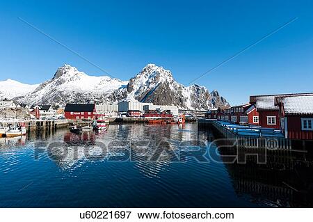 Waterfront houses and snow capped mountains, Svolvaer, Lofoten Islands, Norway View Large Photo Image Stock Photo - Waterfront houses and snow capped mountains, Svolvaer, Lofoten Islands, Norway. Fotosearch