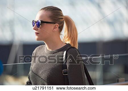 Young man woman, walking outdoors View Large Photo Image Stock Image - Young man woman, walking outdoors. Fotosearch