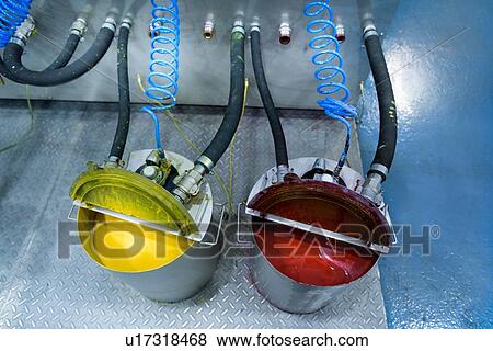 Stock Photo - Buckets of ink in food packaging printing factory. Fotosearch