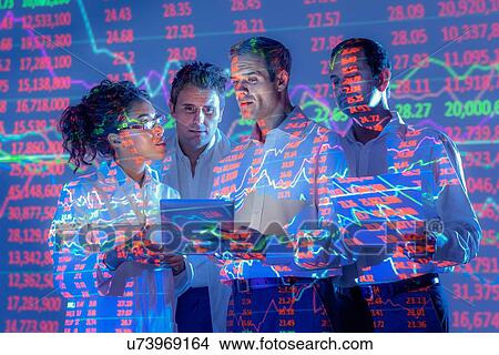 Business people in conversation with graphical projected data View Large Photo Image Picture - Business people in conversation with graphical projected data. Fotosearch