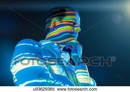 Businessman in thought with projected graphical financial data View Large Photo Image Stock Photography - Businessman in thought with projected graphical financial data. Fotosearch