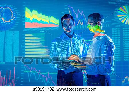 Stock Image - Businessmen in conversation with projected graphical financial data. Fotosearch