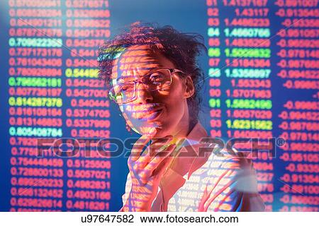 Businesswoman in thought with projected financial numbers View Large Photo Image Stock Image - Businesswoman in thought with projected financial numbers. Fotosearch