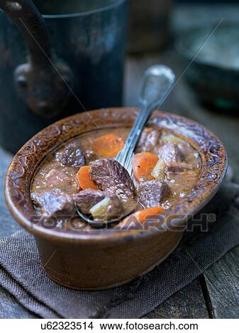 Picture - Casserole dish with provence daube of beef and carrots. Fotosearch