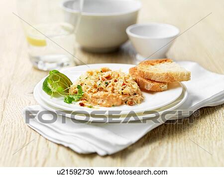 Chilli crab cocktail with sliced toasted bread View Large Photo Image Stock Image - Chilli crab cocktail with sliced toasted bread. Fotosearch