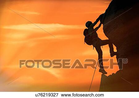 Climber on rocky wall at sunset, Mont Blanc, France View Large Photo Image Stock Photo - Climber on rocky wall at sunset, Mont Blanc, France. Fotosearch