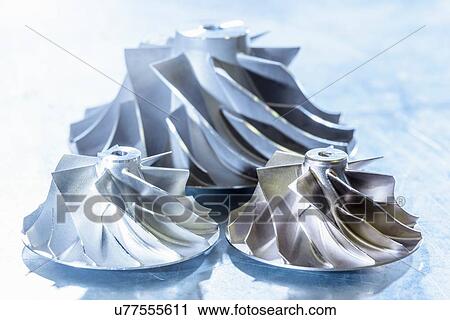 Close up of turbocharger turbines in research facility View Large Photo Image Stock Image - Close up of turbocharger turbines in research facility. Fotosearch