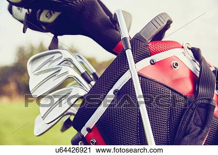 Close up view of golf bag with clubs View Large Photo Image Stock Image - Close up view of golf bag with clubs. Fotosearch