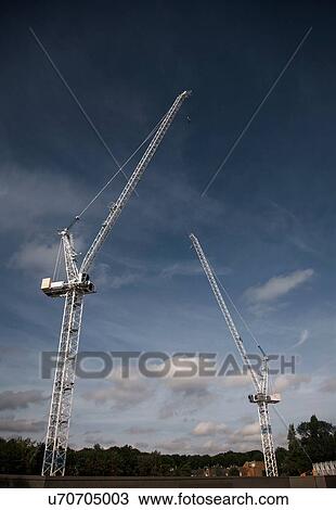 Cranes at construction site View Large Photo Image Stock Image - Cranes at construction site. Fotosearch