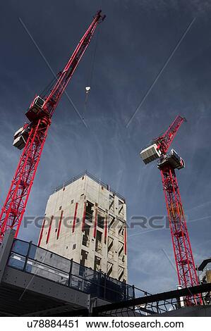 Cranes at construction site View Large Photo Image Stock Image - Cranes at construction site. Fotosearch