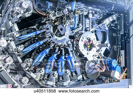 Detail of ink jet printer in food packaging printing factory View Large Photo Image Stock Photo - Detail of ink jet printer in food packaging printing factory. Fotosearch
