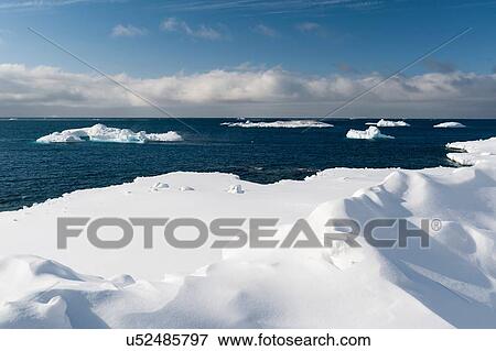 Stock Photo - Elevated view of icebergs in Disko Bay, Greenland. Fotosearch