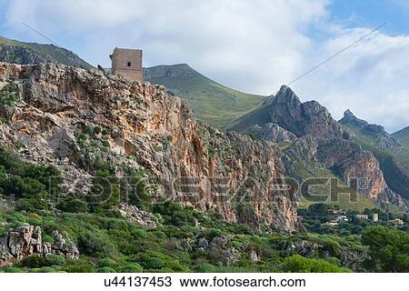 Elevated view of mountain tower, Macari, San Vito Lo Capo, Sicily, Italy View Large Photo Image Stock Image - Elevated view of mountain tower, Macari, San Vito Lo Capo, Sicily, Italy. Fotosearch