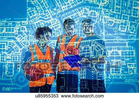 Engineers in discussion with projected plans View Large Photo Image Stock Image - Engineers in discussion with projected plans. Fotosearch