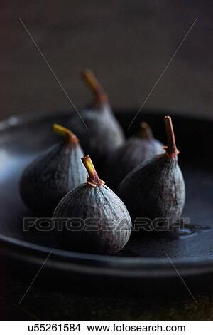 Figs on black plate View Large Photo Image Picture - Figs on black plate. Fotosearch