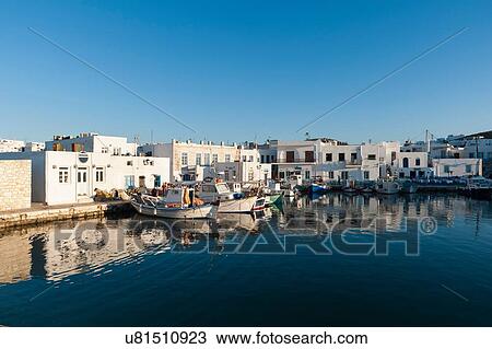Stock Image - Fishing boats moored in harbour, Naousa, Paros, Cyclades Islands, Aegean sea, Greece. Fotosearch