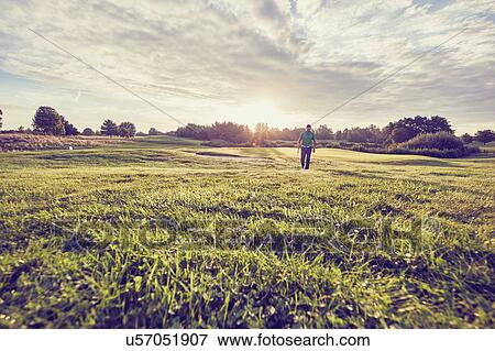 Stock Photo - Golfer on course, Korschenbroich, Dusseldorf, Germany. Fotosearch