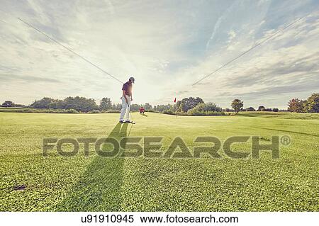 Stock Photography - Golfer on course, Korschenbroich, Dusseldorf, Germany. Fotosearch