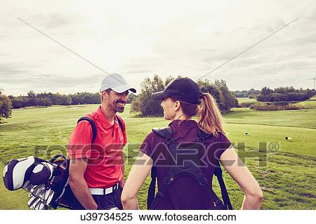 Stock Photography - Golfers on course, Korschenbroich, Dusseldorf, Germany. Fotosearch