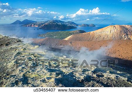 Stock Photo - Gran Cratere (The Large Crater) and view of islands Lipari and Salina, Vulcano Island, Aeolian Islands, Sicily, Italy. Fotosearch