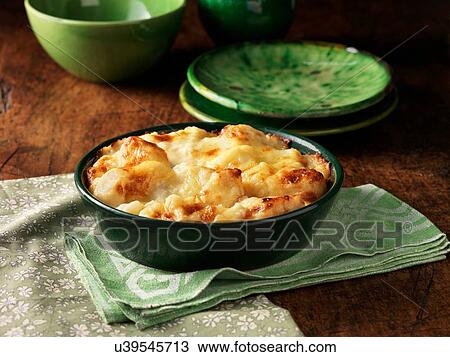 High angle view of cauliflower cheese in round green dish View Large Photo Image Stock Image - High angle view of cauliflower cheese in round green dish. Fotosearch