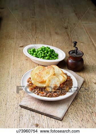 High angle view of minced beef hotpot with peas View Large Photo Image Picture - High angle view of minced beef hotpot with peas. Fotosearch