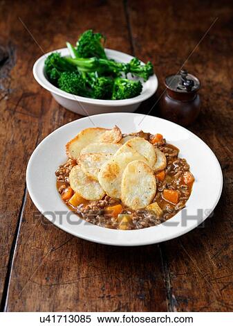 High angle view of minced beef hotpot with broccoli View Large Photo Image Stock Photography - High angle view of minced beef hotpot with broccoli. Fotosearch