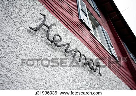 House exterior, word 'heimat' on wall View Large Photo Image Stock Photograph - House exterior, word 'heimat' on wall. Fotosearch
