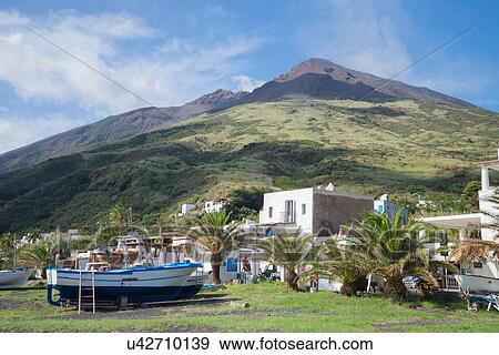 Stock Photo - Houses and boats on Stromboli, Aeolian Islands, Sicily, Italy. Fotosearch