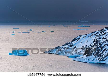 Icebergs in Ilulissat icefjord, Disko Bay, Greenland View Large Photo Image Stock Photograph - Icebergs in Ilulissat icefjord, Disko Bay, Greenland. Fotosearch