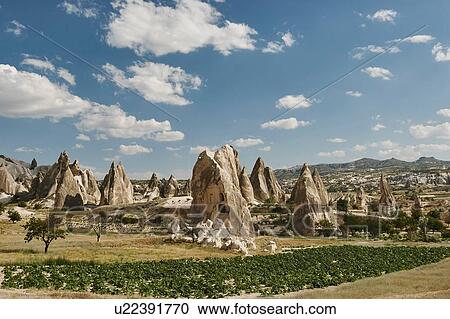 Stock Image - Landscape of rock formation dwellings, Cappadocia, Anatolia, Turkey. Fotosearch