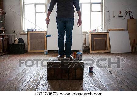 Male artist sitting on crate, looking at blank canvas, low section View Large Photo Image Stock Image - Male artist sitting on crate, looking at blank canvas, low section. Fotosearch