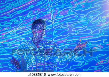 Male scientist making presentation with graphical geological data projection View Large Photo Image Stock Photograph - Male scientist making presentation with graphical geological data projection. Fotosearch