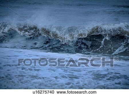 Ocean waves at dusk View Large Photo Image Stock Image - Ocean waves at dusk. Fotosearch