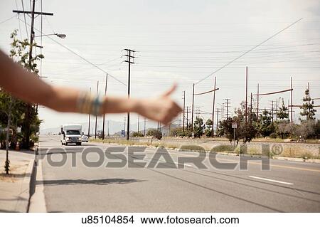 Person hitchhiking, Los Angeles, California, USA View Large Photo Image Picture - Person hitchhiking, Los Angeles, California, USA. Fotosearch